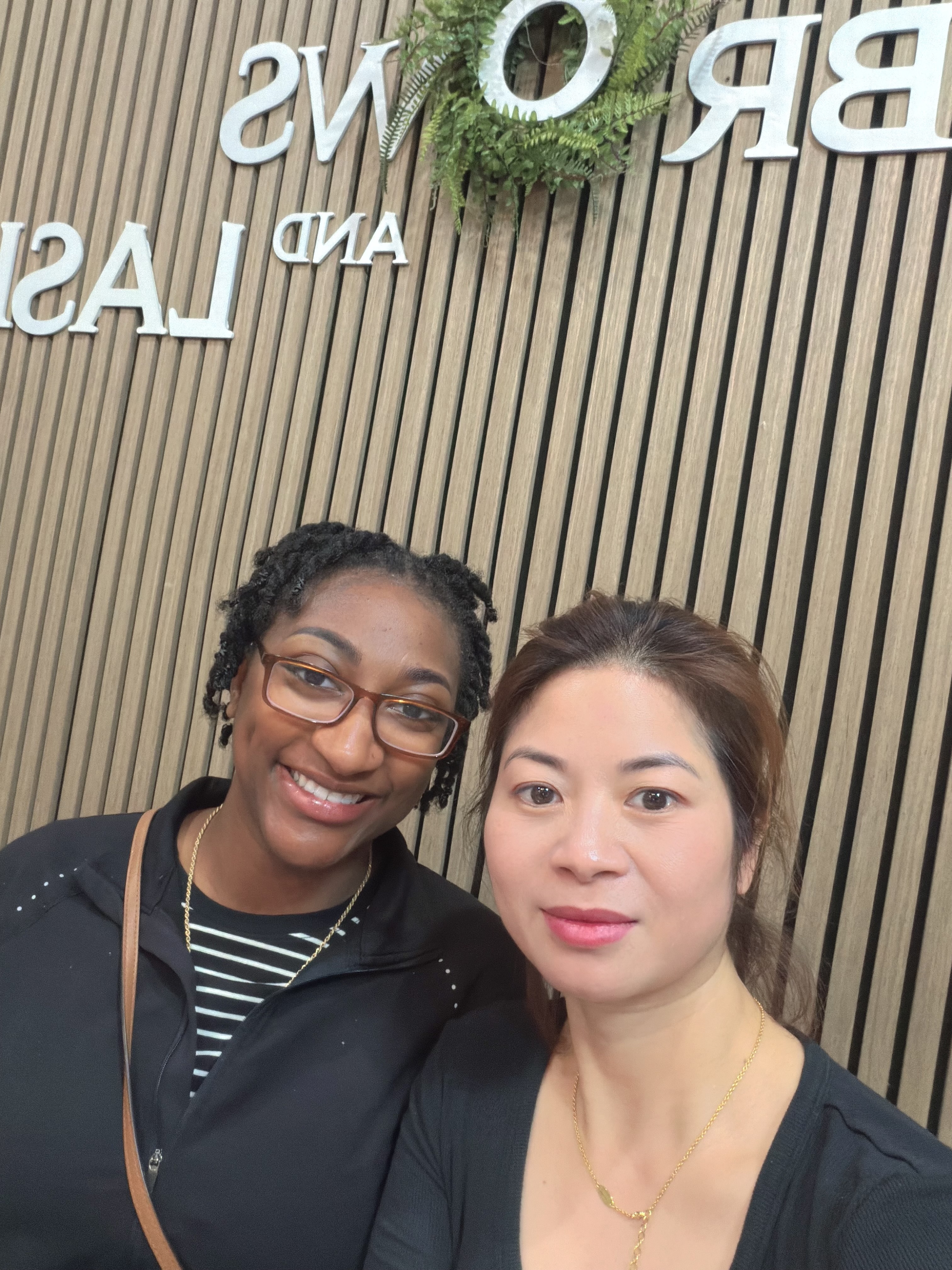 Verified client smiling with Lynn Do at IrisBrows Tennessee studio